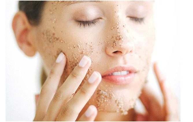 woman using facial mask